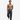 Man wearing black leather pants on a white background